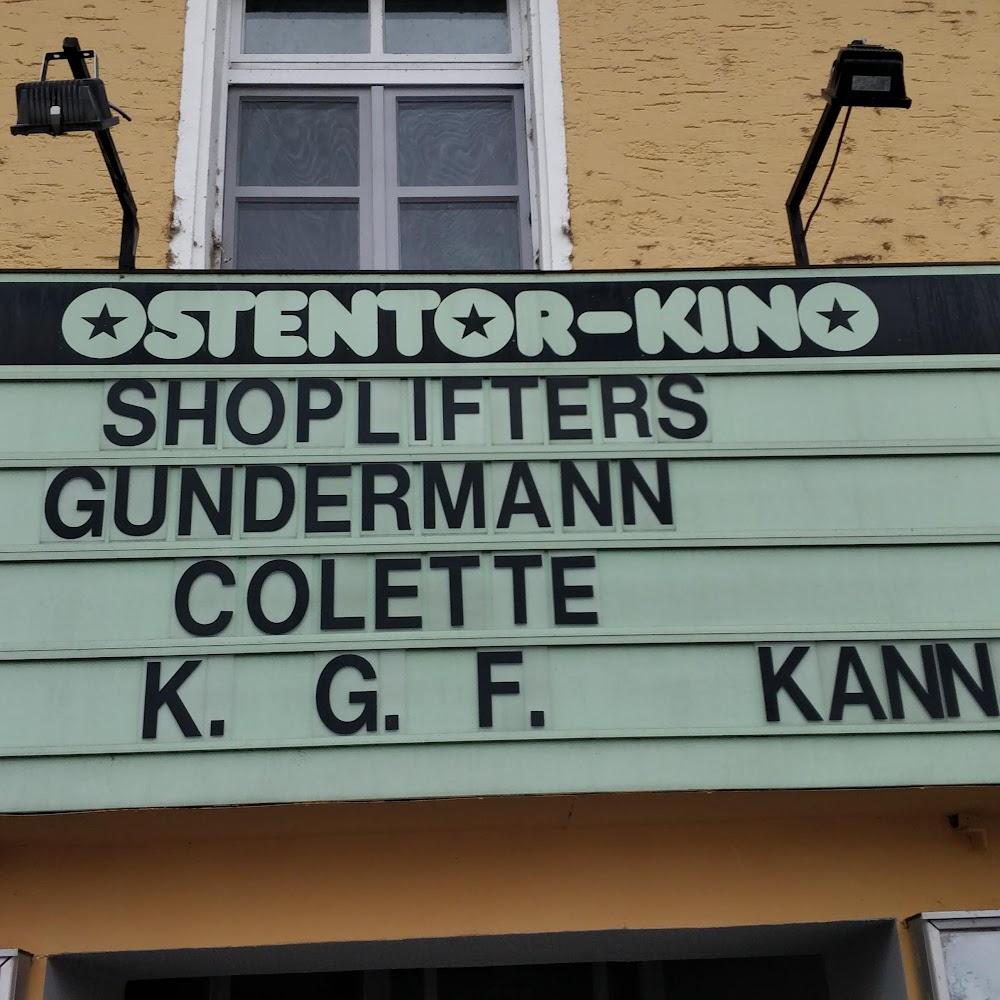 A movie theater sign with the name